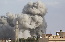 SMOKE RISES OVER TOWN AFTER AIRSTRIKE IN SYRIA