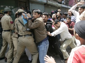 INDIAN POLICE HOLD BACK ACTIVISTS DURING PROTEST IN INDIA