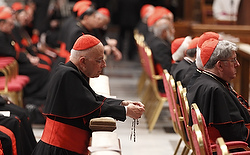 Cardinal George prays rosary before prayer service with eucharistic adoration in St. Peter's Basilica