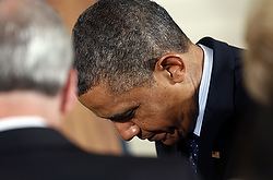 Le président Obama incline la tête en signe d'humilité lors du déjeuner de la prière de Pâques à la Maison Blanche (photo CNS/Kevin Lamarque, Reuters).