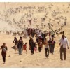 Des centaines de yazudus fuyant leurs maison le 10 août, dans les mons Sinjar (photo: Radio Vatican/Reuters).