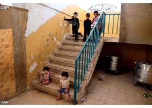 Des réfugiés de la région de Mossoul réfugiès à Bagdad (photo AP).