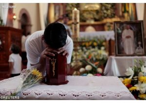 Obsèques d'un prêtre assassiné en septembre 2016. - REUTERS